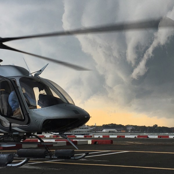 a helicopter parked in a parking lot