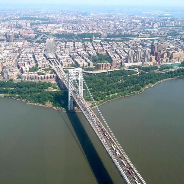 a view of a large body of water with a city in the background